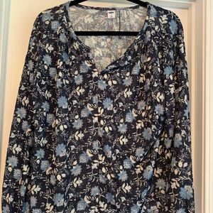 Long sleeve flower shirt.